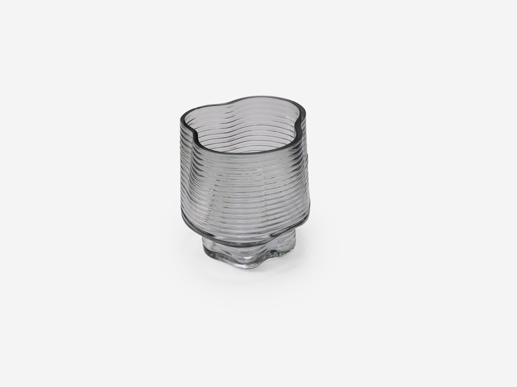 Small ridged glass flower vase angle view